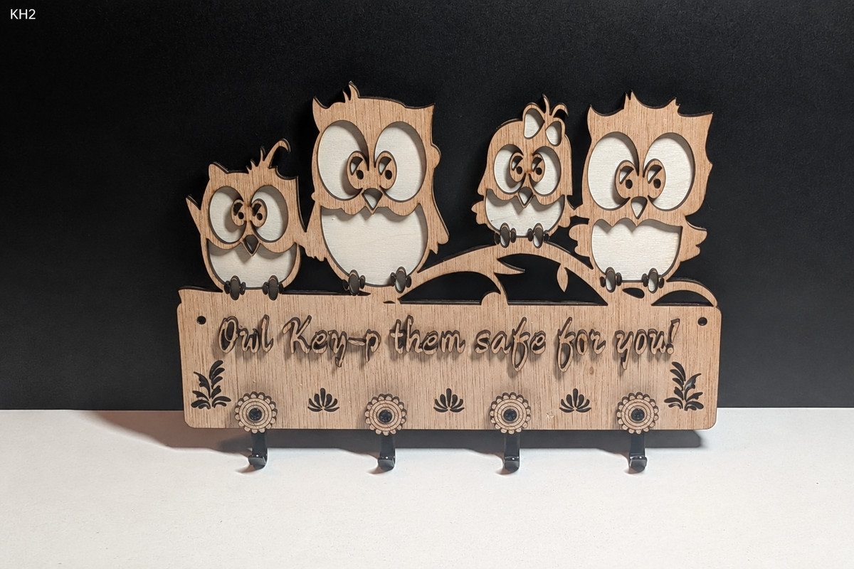 Owl family key holder with KH2 label top left